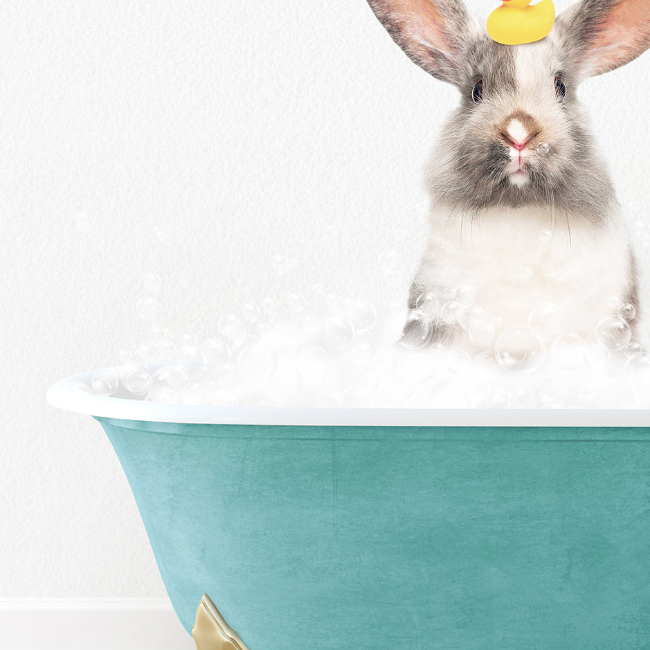 a rabbit in a bathtub with a rubber duck on its head