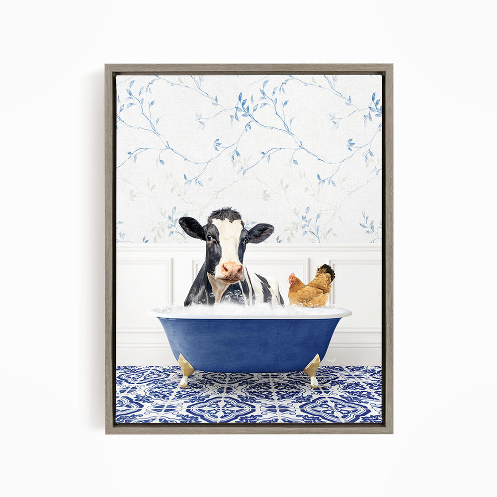 A black and white cow is sitting in a blue bathtub, with a chicken standing nearby, in a room with a blue and white patterned floor.
