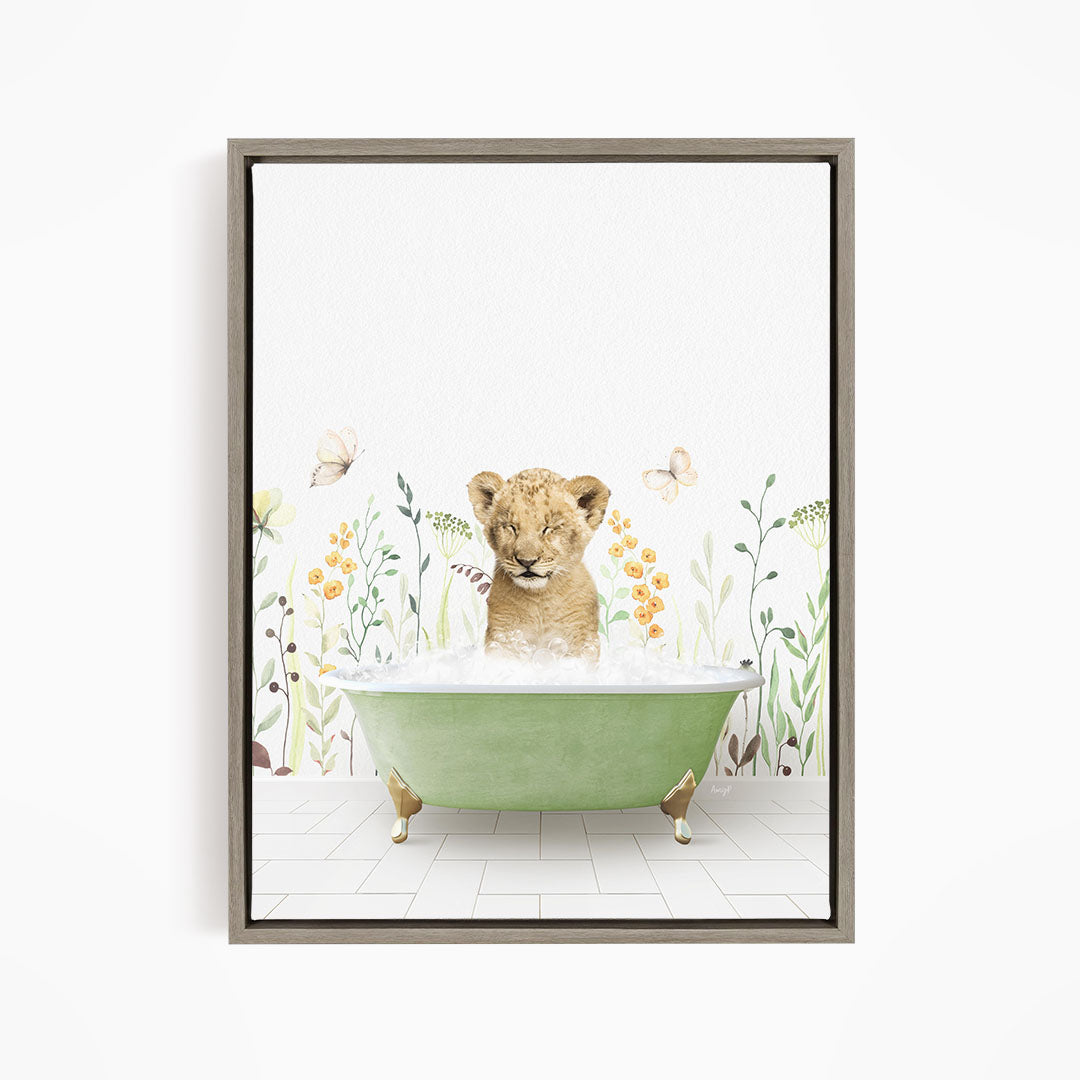 A young lion cub sitting in a green bathtub filled with water, surrounded by flowers and butterflies.