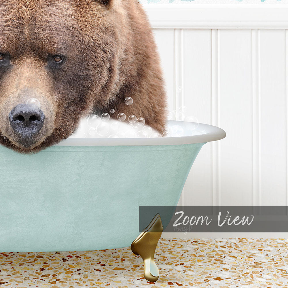A close-up of a bear sitting in a bathtub filled with bubbles, with a text overlay that reads "Zoom View".