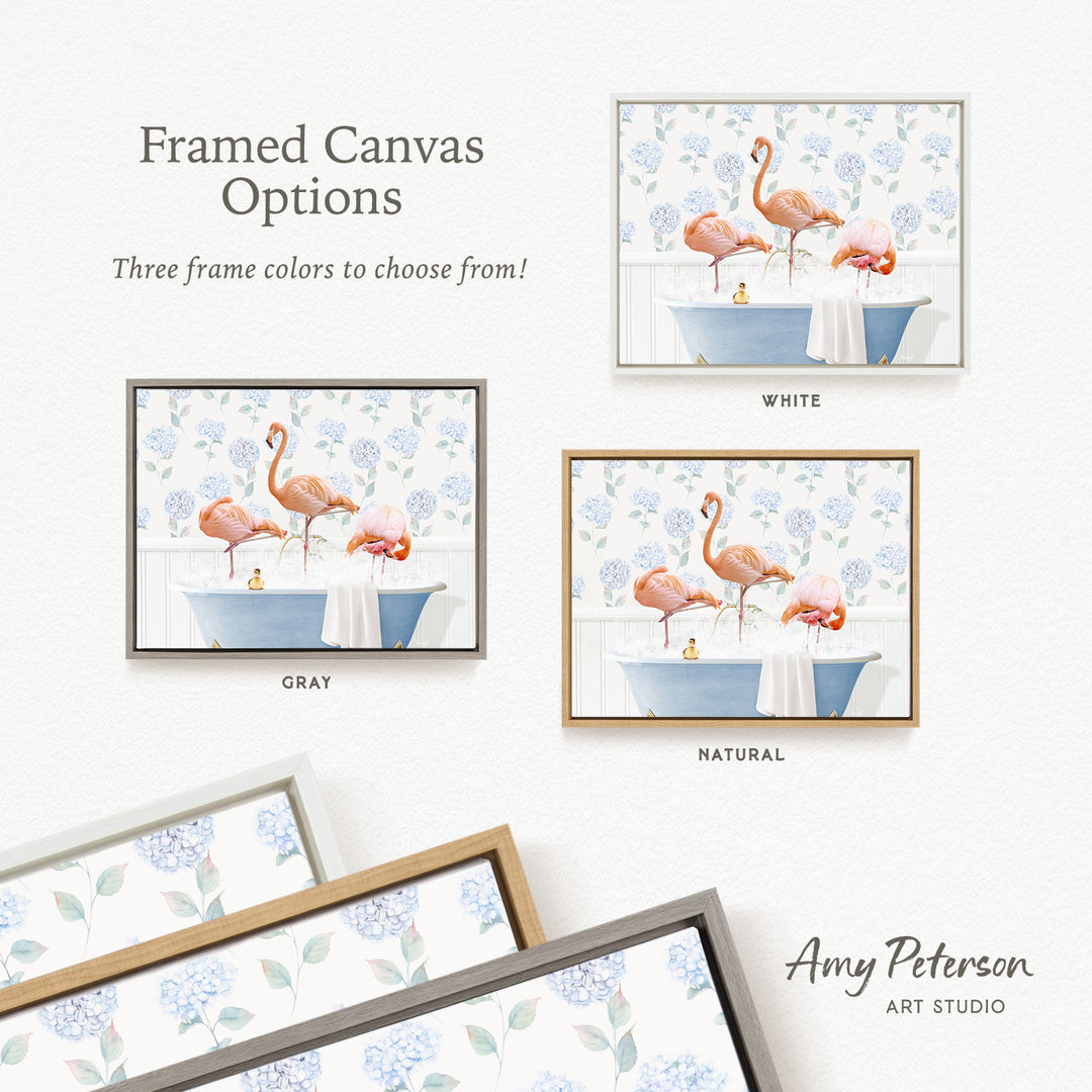 The image is a framed canvas with three different frame colors to choose from: white, gray, and natural. The canvas features a painting of two pink flamingos in a bathtub, surrounded by blue flowers.