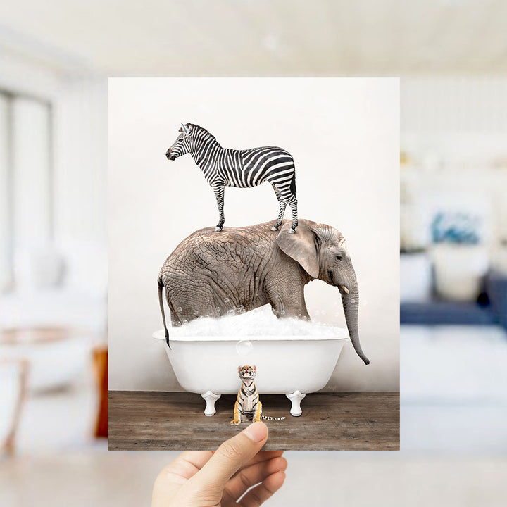 A zebra standing on an elephant's back in a bathtub, with a small tiger figurine sitting in the tub next to the elephant.