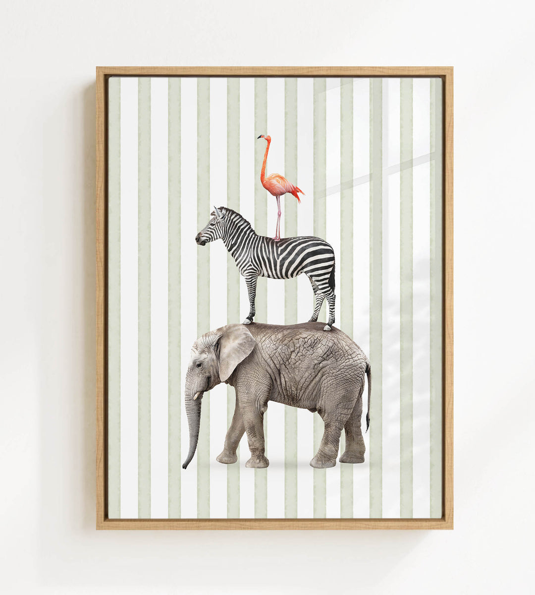 A framed collage of a zebra, a flamingo, and an elephant, all standing on top of each other against a striped background.