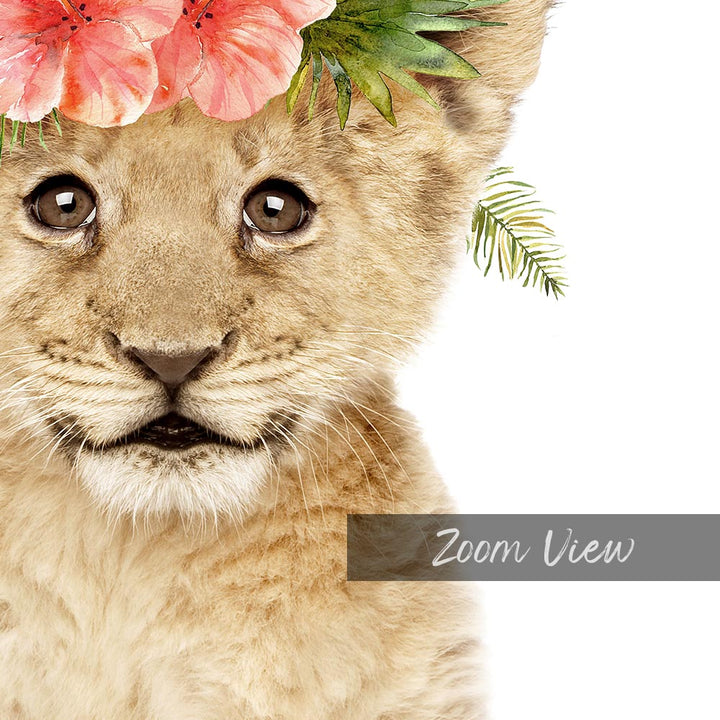 a lion cub with a flower on its head