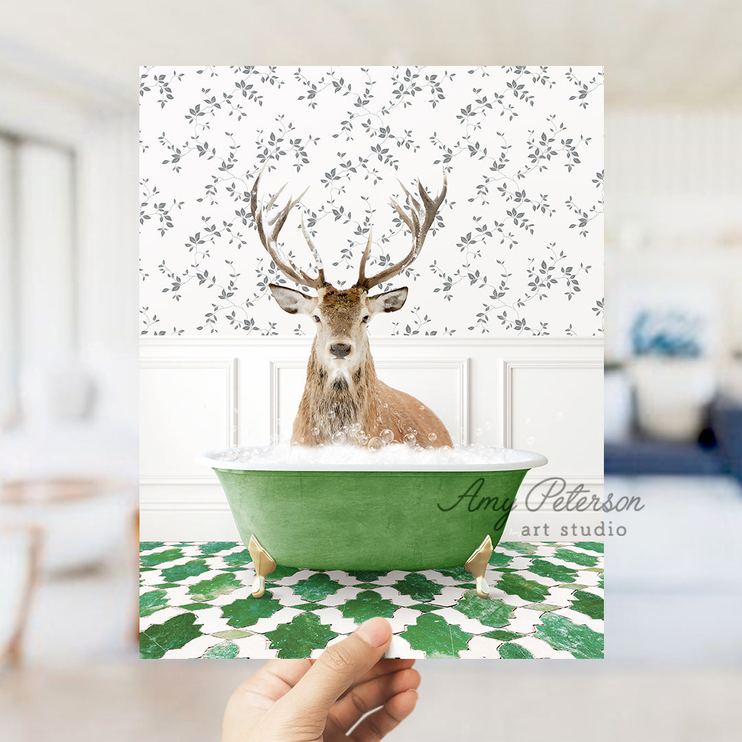 a person holding up a card with a picture of a deer in a bathtub