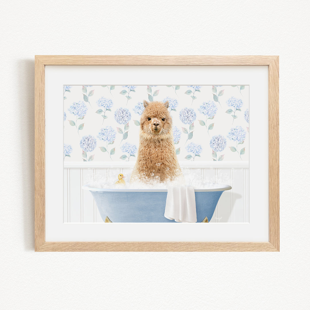 A brown dog sitting in a blue bathtub filled with bubbles, surrounded by a floral patterned wall.
