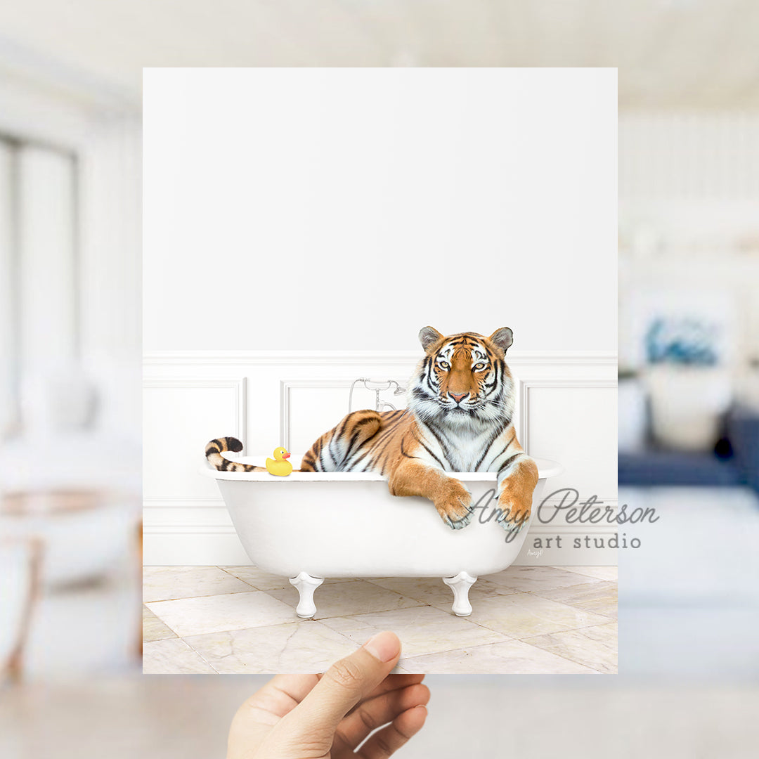 a hand holding up a card with a picture of a tiger in a bathtub