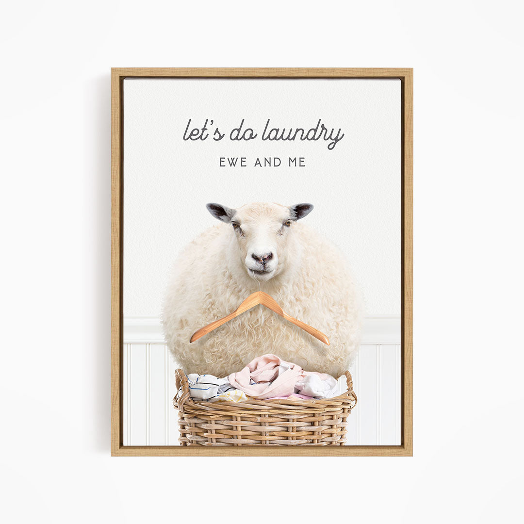 A sheep sitting in a basket filled with laundry, with the text "let's do laundry EWE AND ME" displayed above the image.