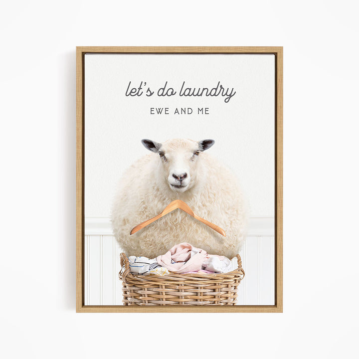 A sheep sitting in a basket filled with laundry, with the text "let's do laundry EWE AND ME" displayed above the image.