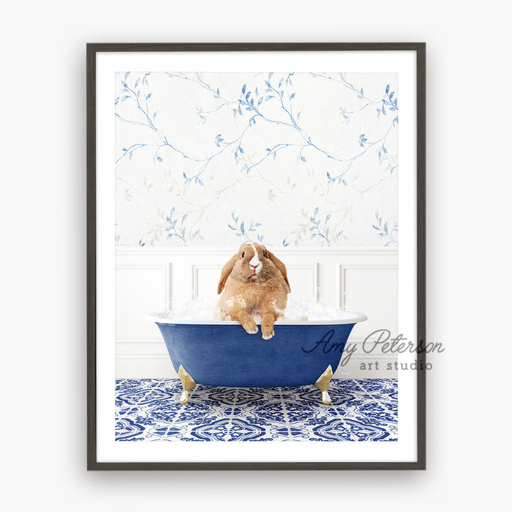 a brown dog sitting in a blue bath tub