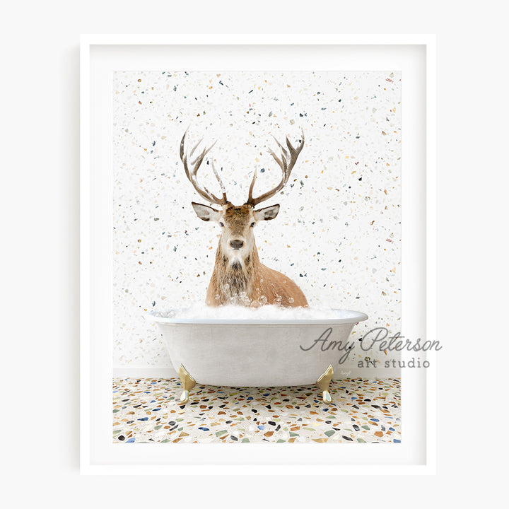 a picture of a deer sitting in a bathtub