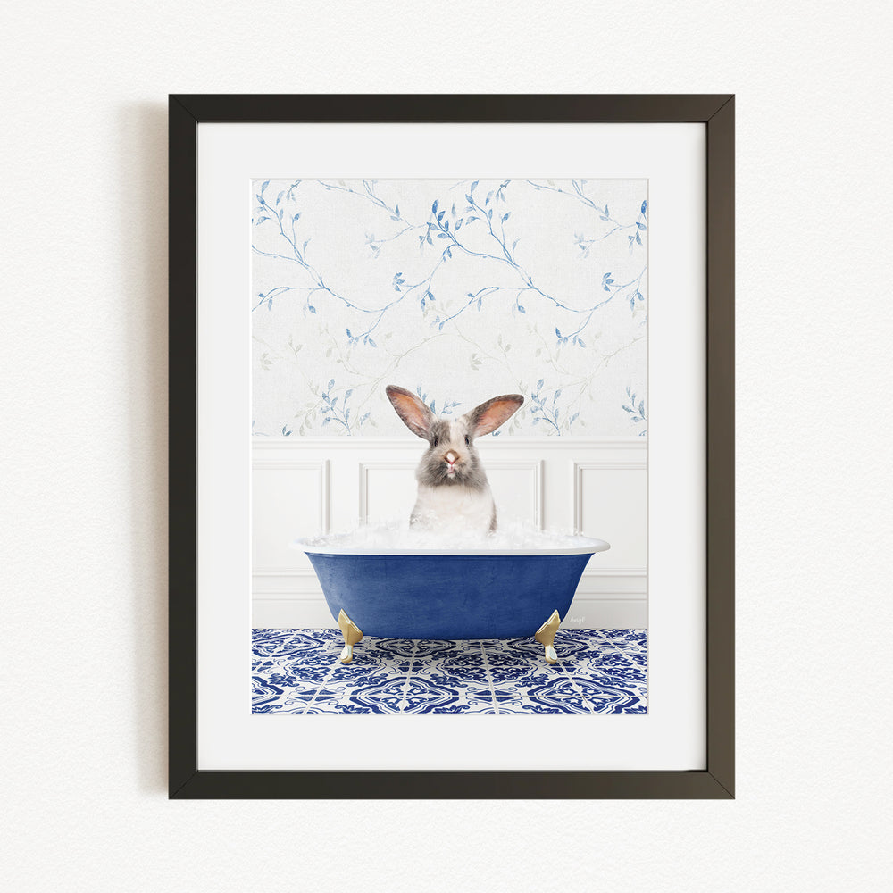 A white rabbit sitting in a blue bathtub filled with water, with a patterned tile floor in the background.