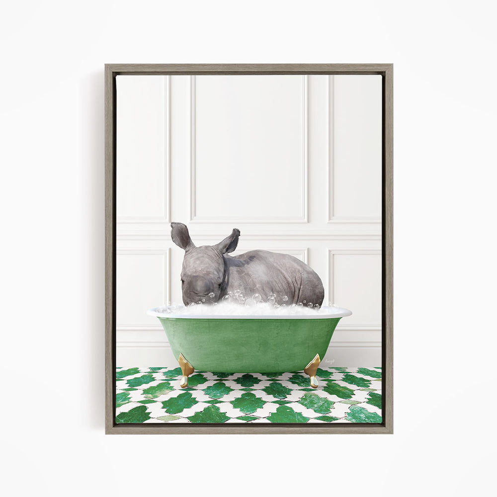 A rhinoceros is sitting in a green bathtub filled with water, surrounded by a green and white patterned floor.