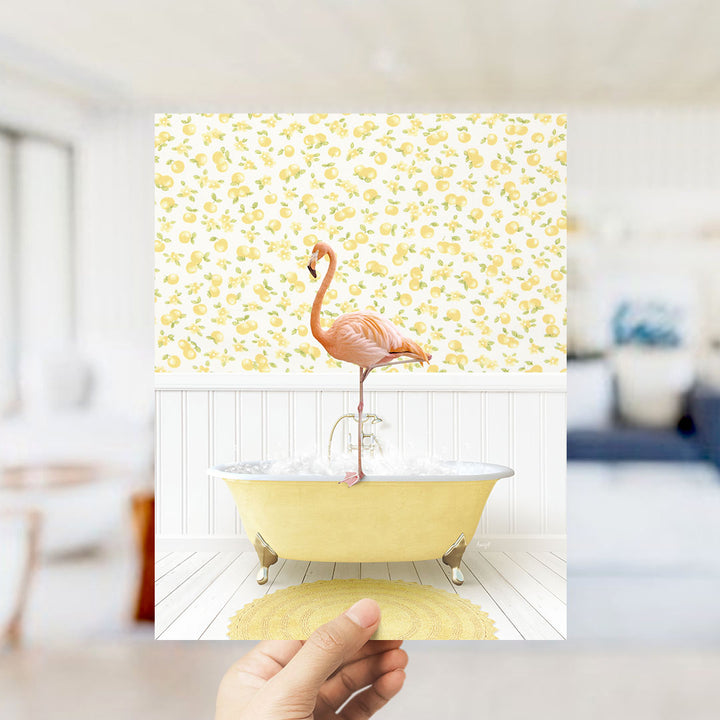 A pink flamingo standing in a yellow bathtub filled with water, set against a yellow and white floral wallpaper.