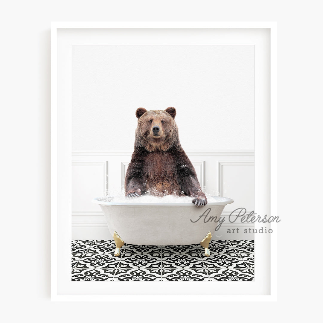 a brown bear sitting in a bathtub with a black and white tile floor