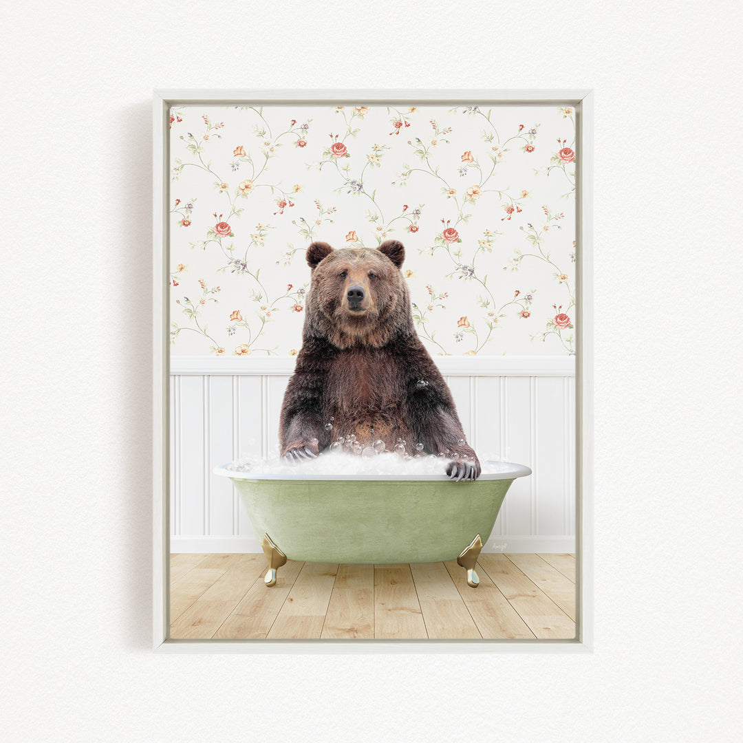 A brown bear sitting in a green bathtub filled with water, with a floral wallpaper in the background.