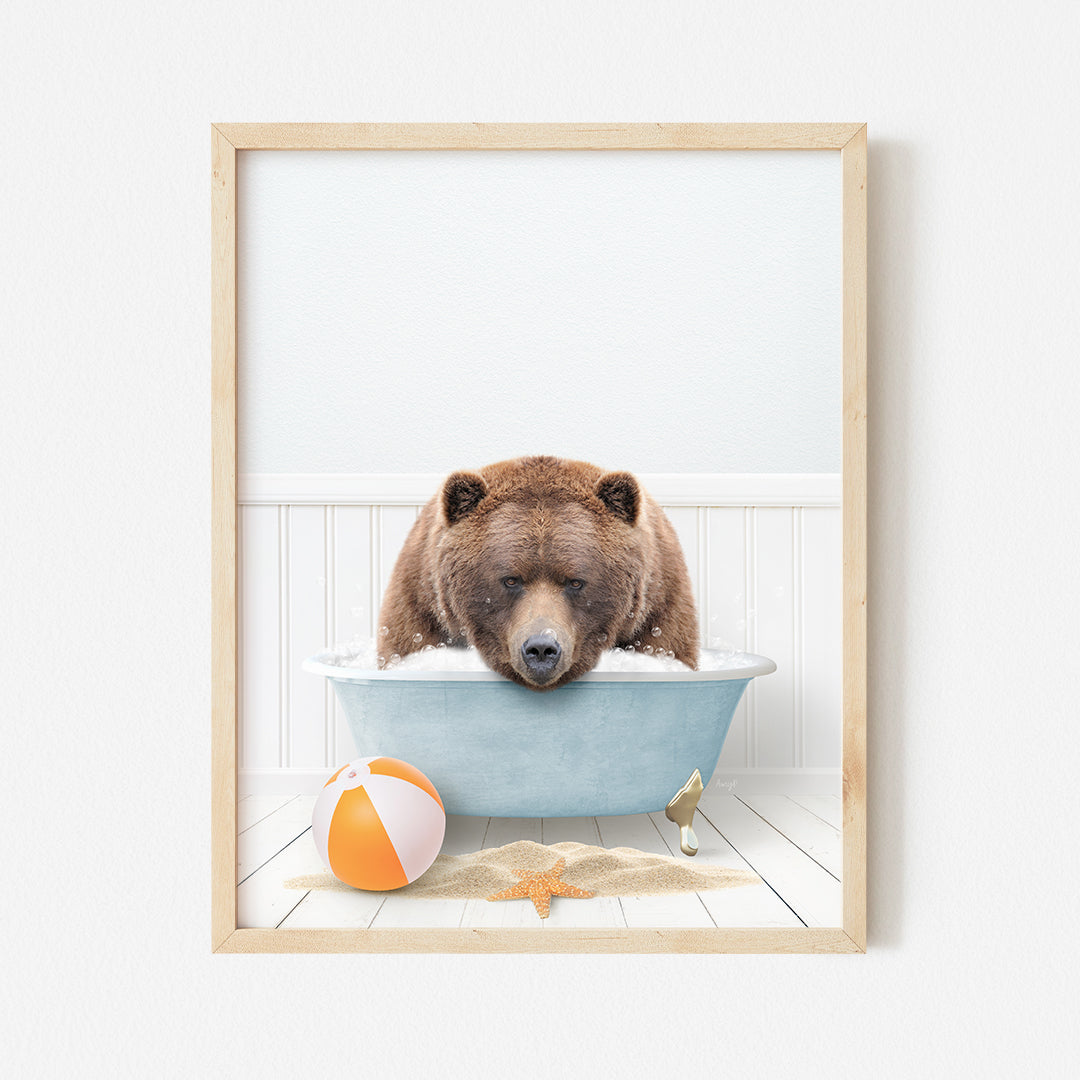 a picture of a bear in a bathtub with a beach ball