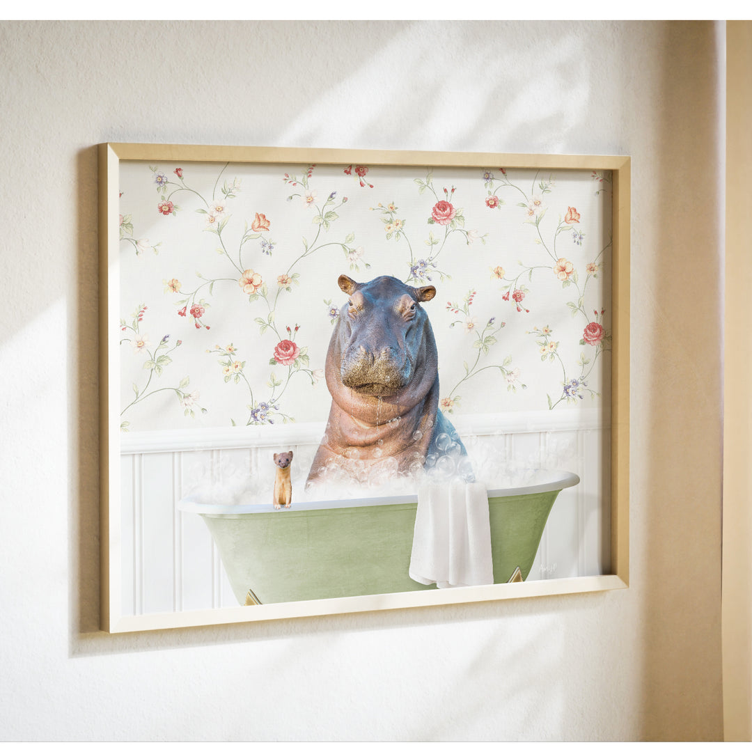 A framed image depicting a hippopotamus sitting in a bathtub, surrounded by a floral patterned wallpaper.