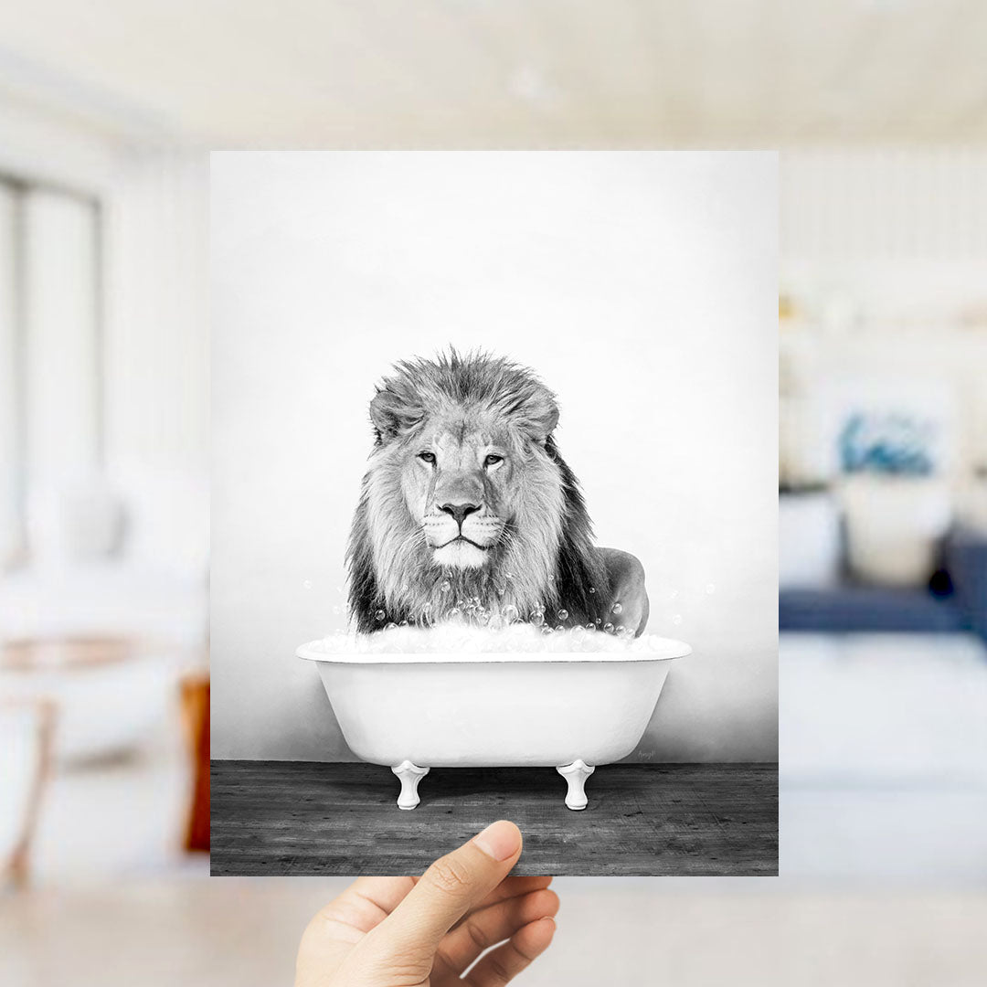 A lion sitting in a bathtub filled with water, as if taking a bath.