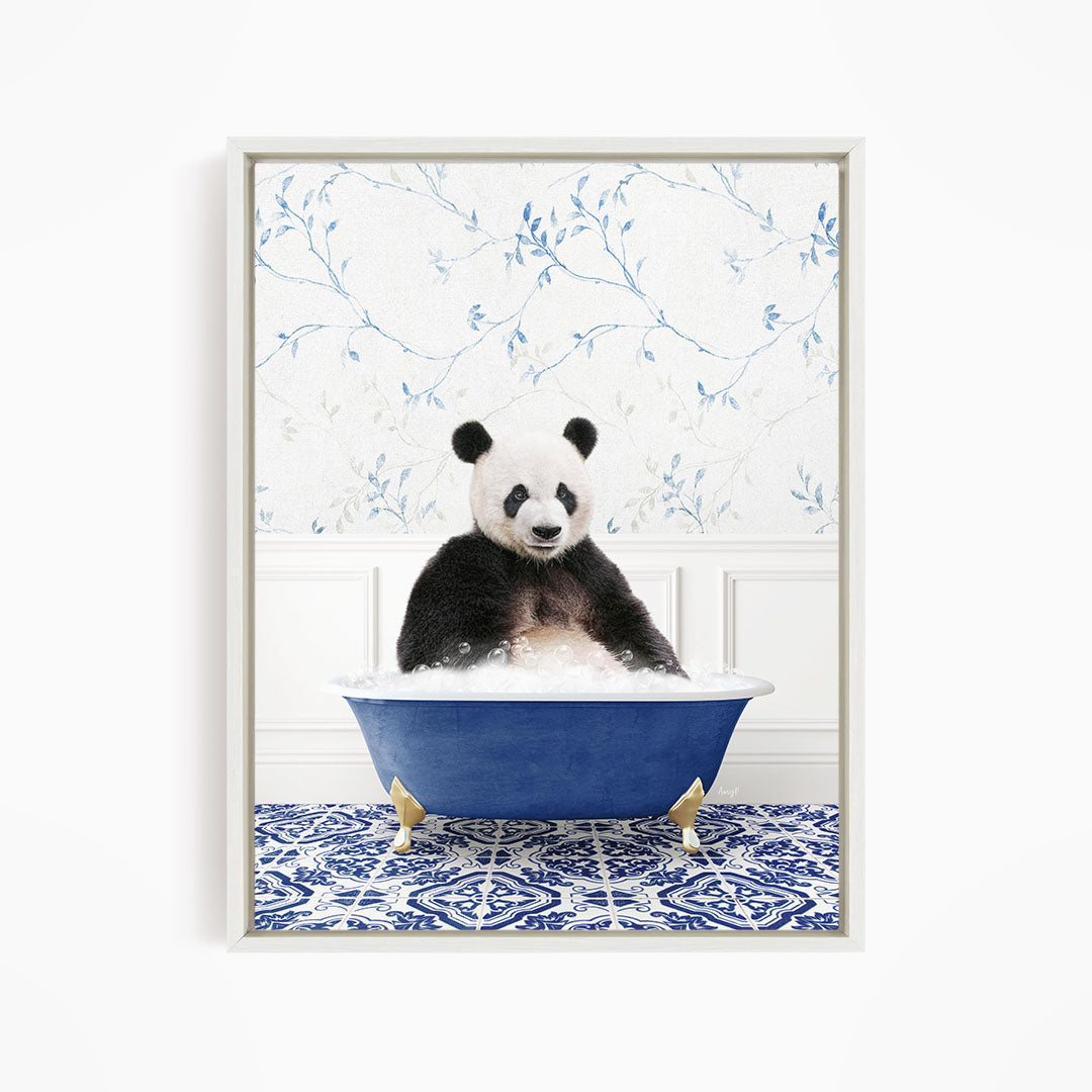 A panda bear sitting in a blue bathtub, surrounded by a blue and white patterned floor.