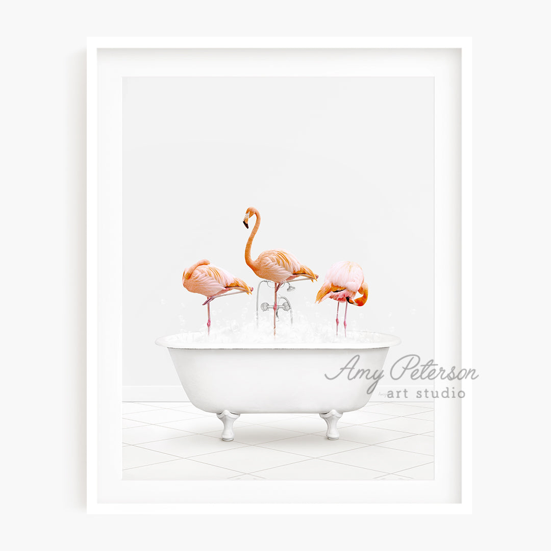 a group of pink flamingos in a bathtub