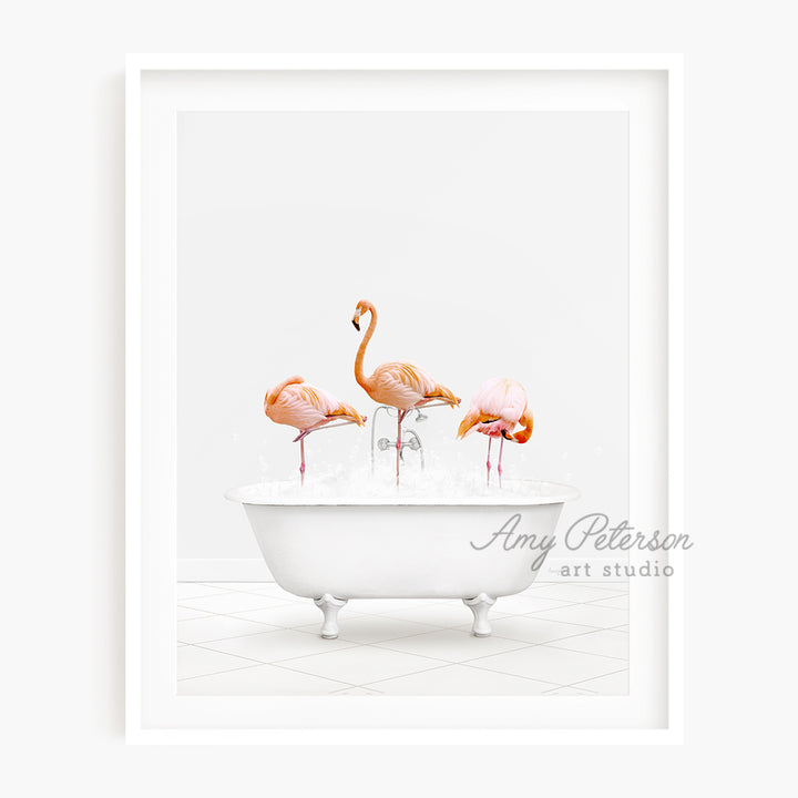 a group of pink flamingos in a bathtub