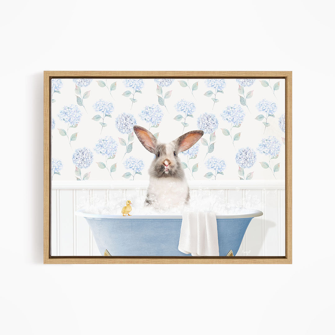 A white rabbit sitting in a blue bathtub, surrounded by blue flowers on the wall.