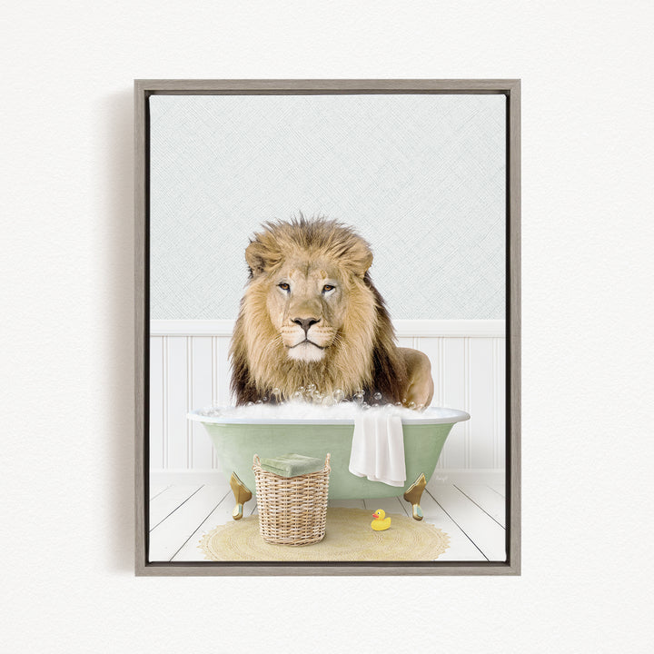 A lion sitting in a bathtub filled with water, surrounded by a basket of toys and a rubber duck.