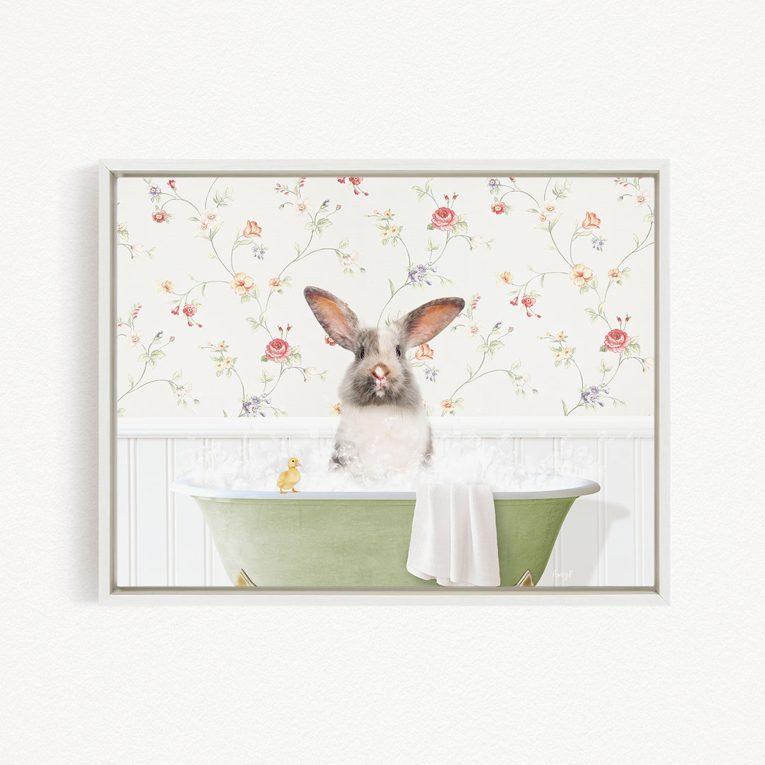 A white rabbit sitting in a green bathtub filled with water, surrounded by a floral wallpaper.
