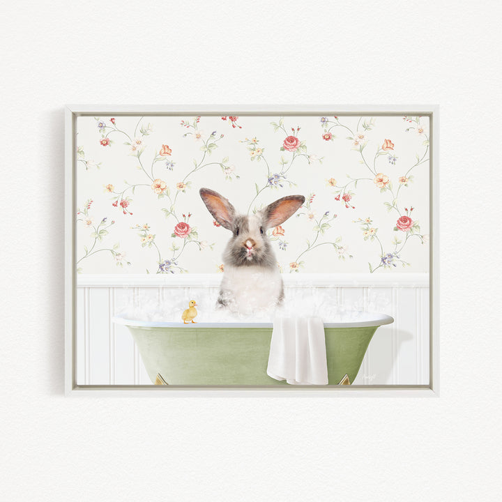 A white rabbit sitting in a green bathtub filled with water, surrounded by a floral wallpaper.