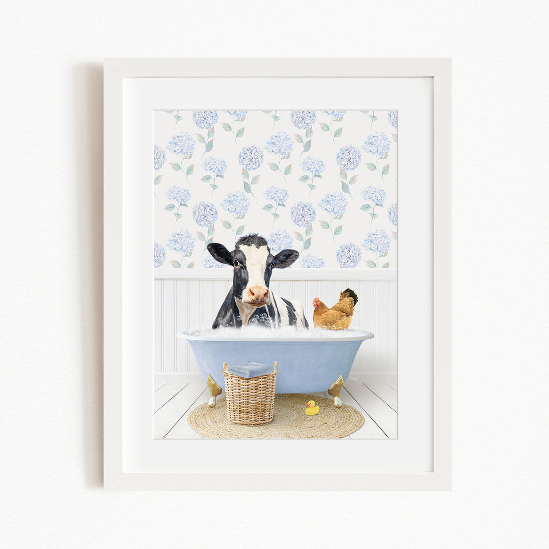 A black and white cow is sitting in a blue bathtub, surrounded by a chicken and a duck, with a blue floral wallpaper in the background.