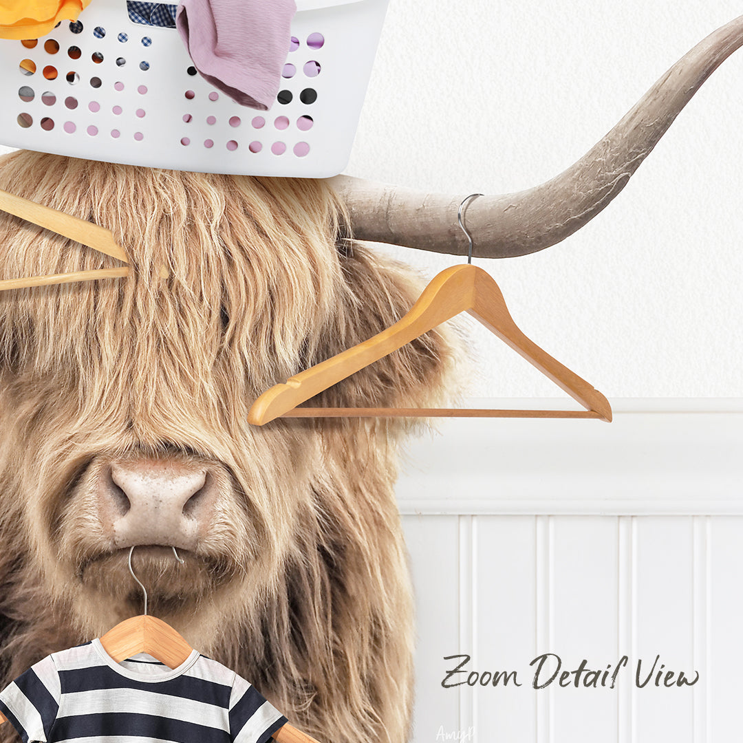 A large, shaggy-haired animal with a horn on its head, wearing a striped shirt, and surrounded by clothes hangers and a laundry basket.