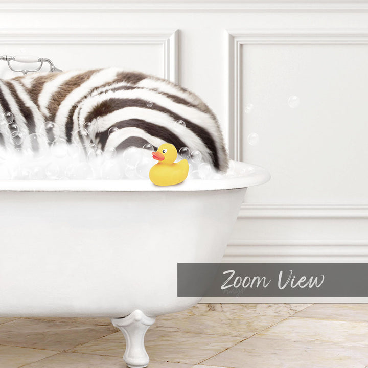 A white bathtub filled with bubbles, with a yellow rubber duck sitting in the water.