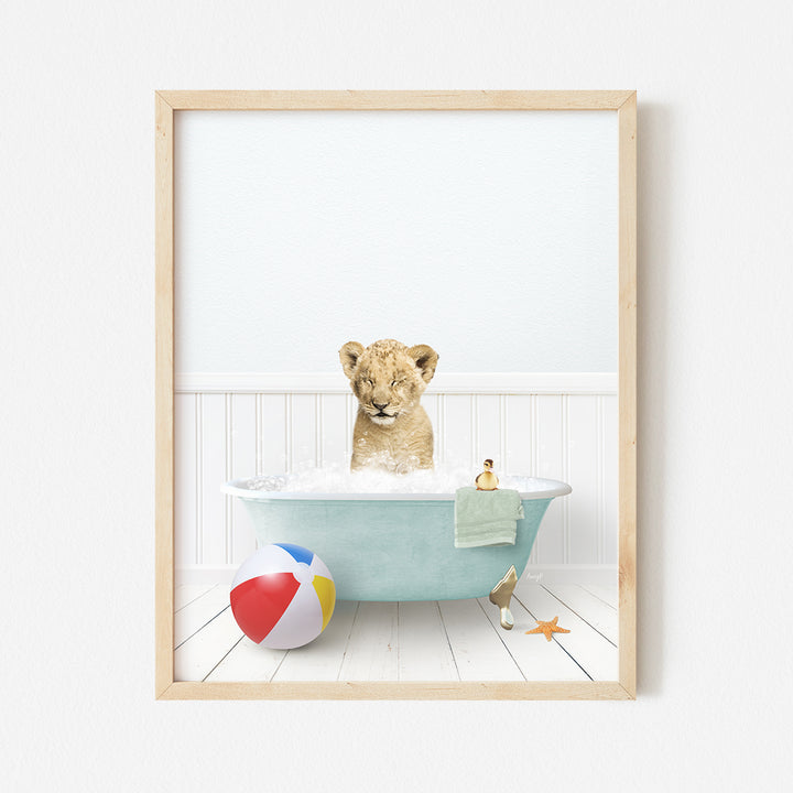 a picture of a baby lion in a bathtub