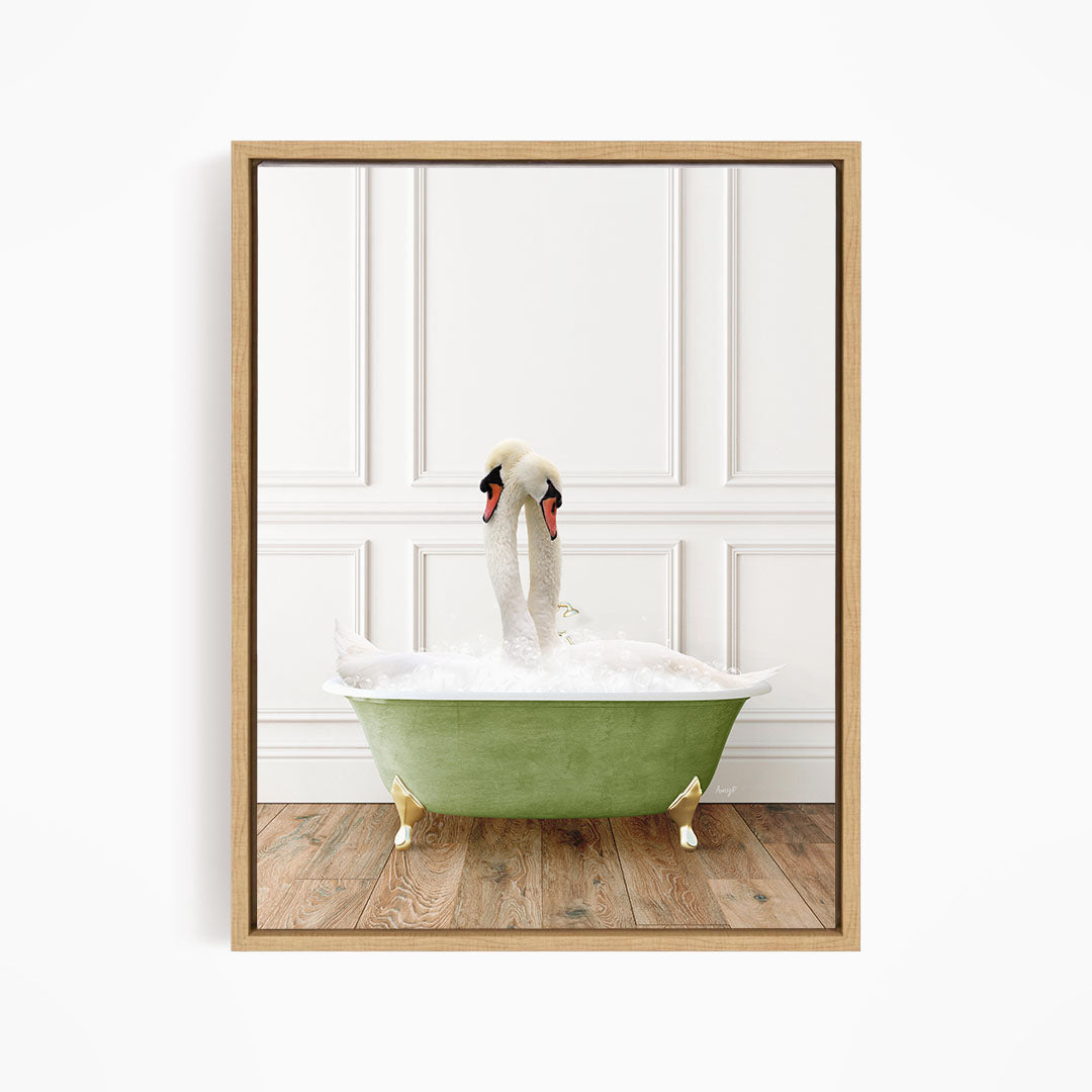 A white swan standing in a green bathtub filled with water, with its head and neck submerged.