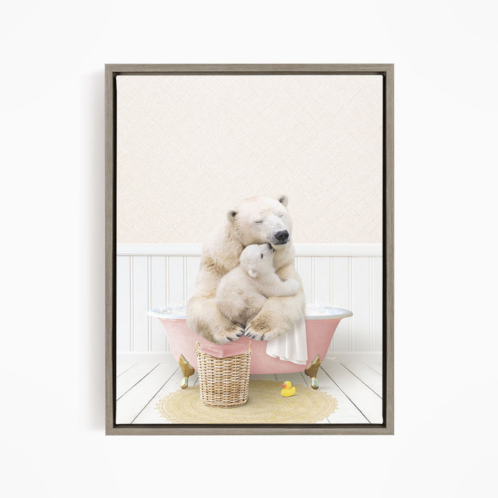 A polar bear and its cub sitting in a pink bathtub, surrounded by a yellow rubber duck and a basket.