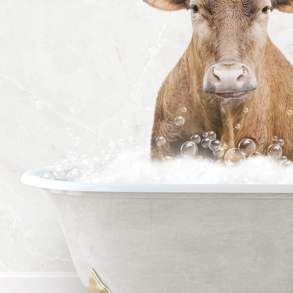 a cow is sitting in a bathtub with bubbles