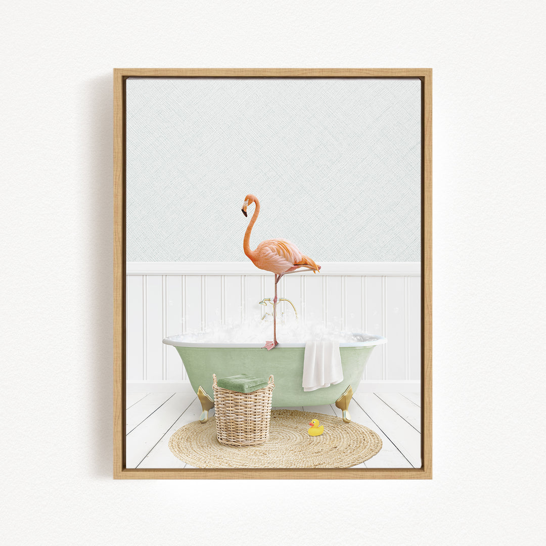 A pink flamingo stands on the edge of a green bathtub filled with bubbles, surrounded by a basket of toys and a yellow rubber duck.