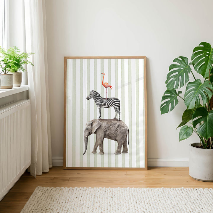 a framed poster of a zebra, an elephant, and a flamingo, all standing on top of each other, creating a unique and visually striking composition.