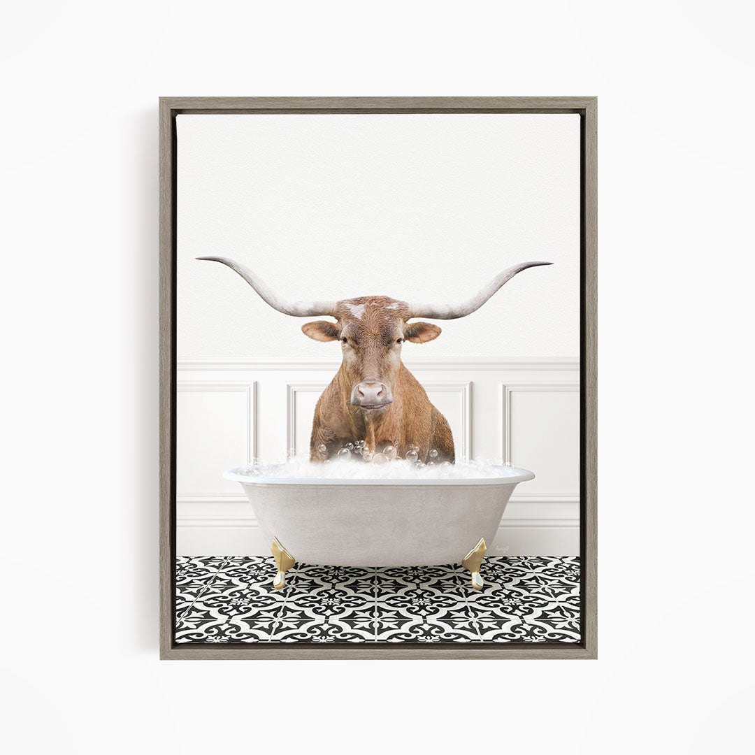 A brown bull with large horns is sitting in a white bathtub filled with bubbles, creating a whimsical and playful scene.