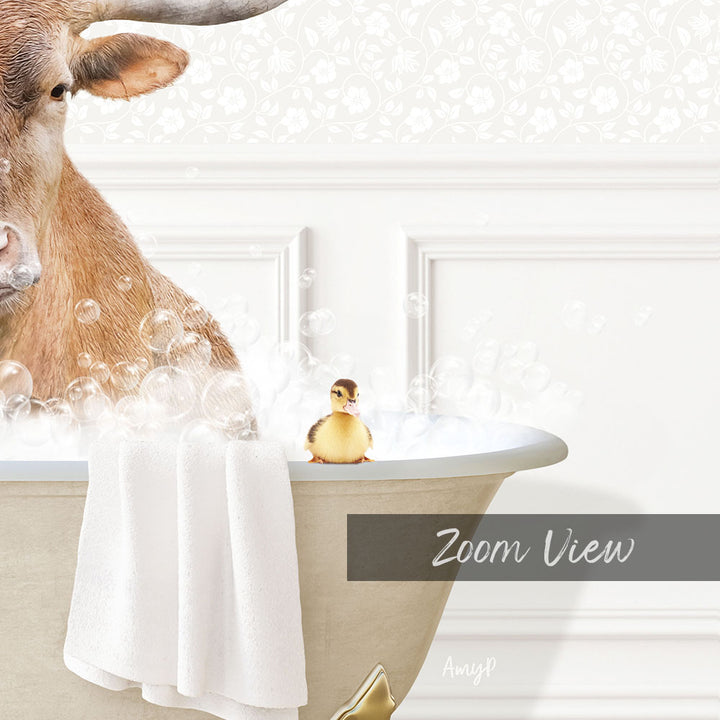 A cow is sitting in a bathtub filled with bubbles, with a small yellow duck perched on the edge of the tub.