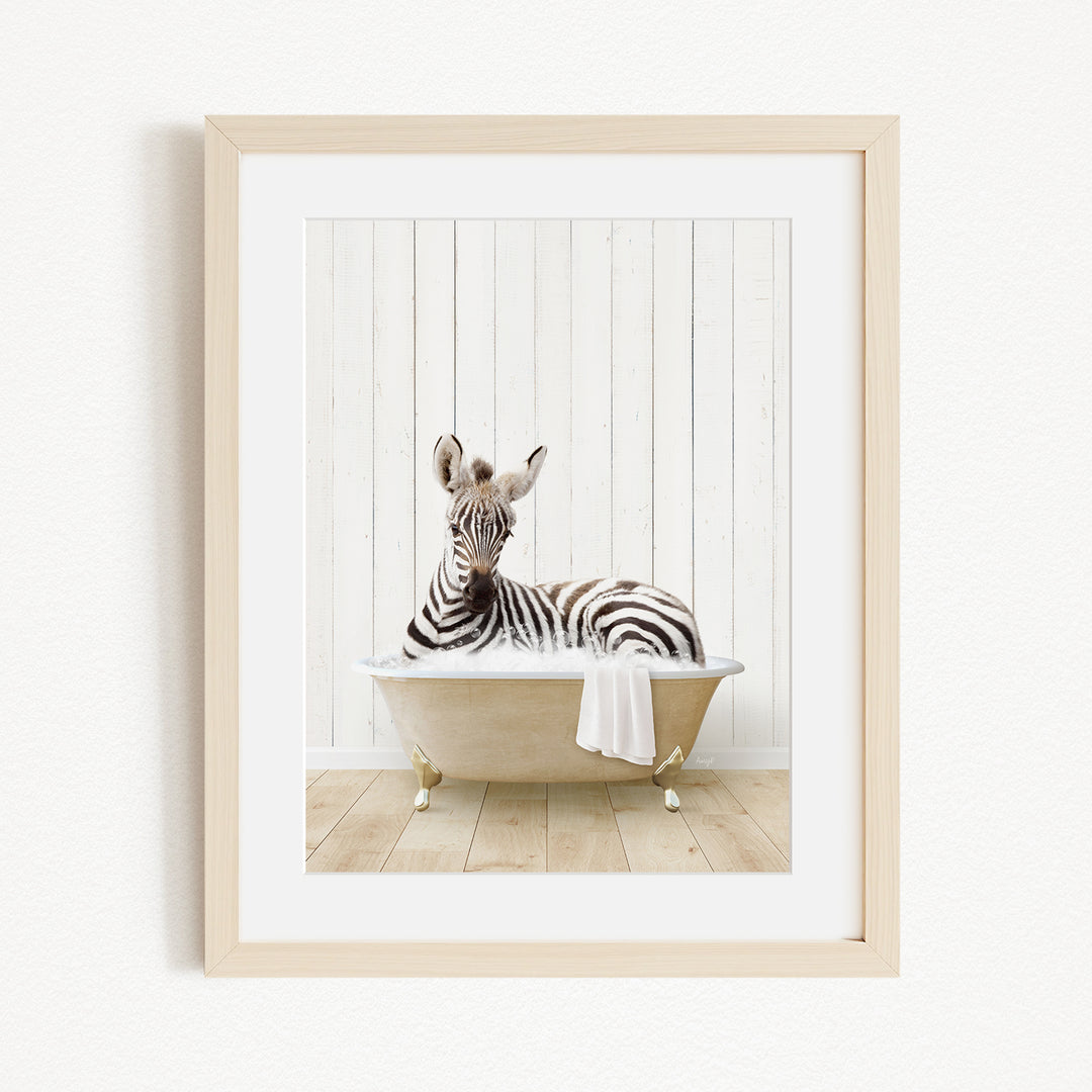 A zebra is sitting in a bathtub filled with water, creating a whimsical and playful scene.