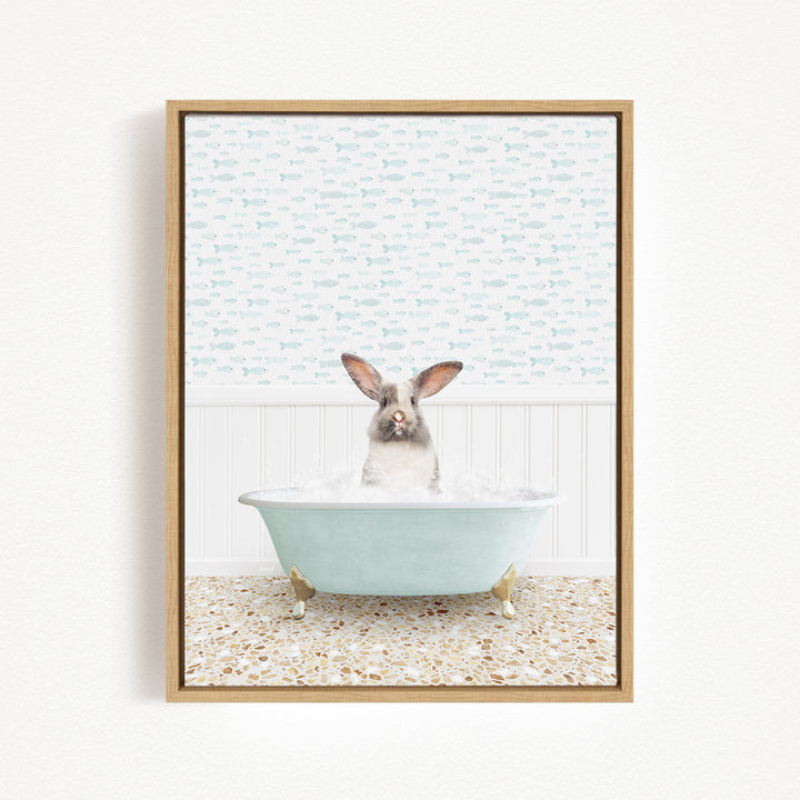 A rabbit sitting in a bathtub filled with water, surrounded by a patterned wall and a tiled floor.