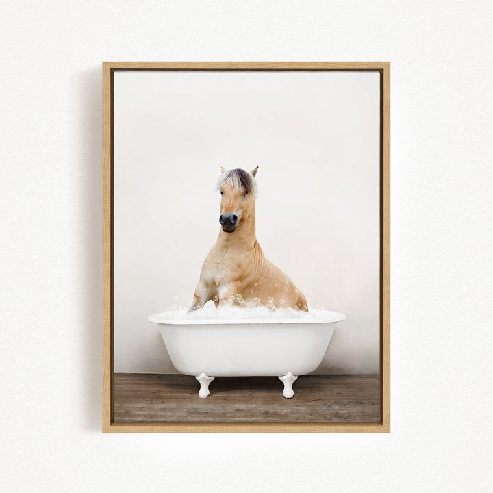 A light brown horse is sitting in a white bathtub filled with water, creating a serene and peaceful scene.