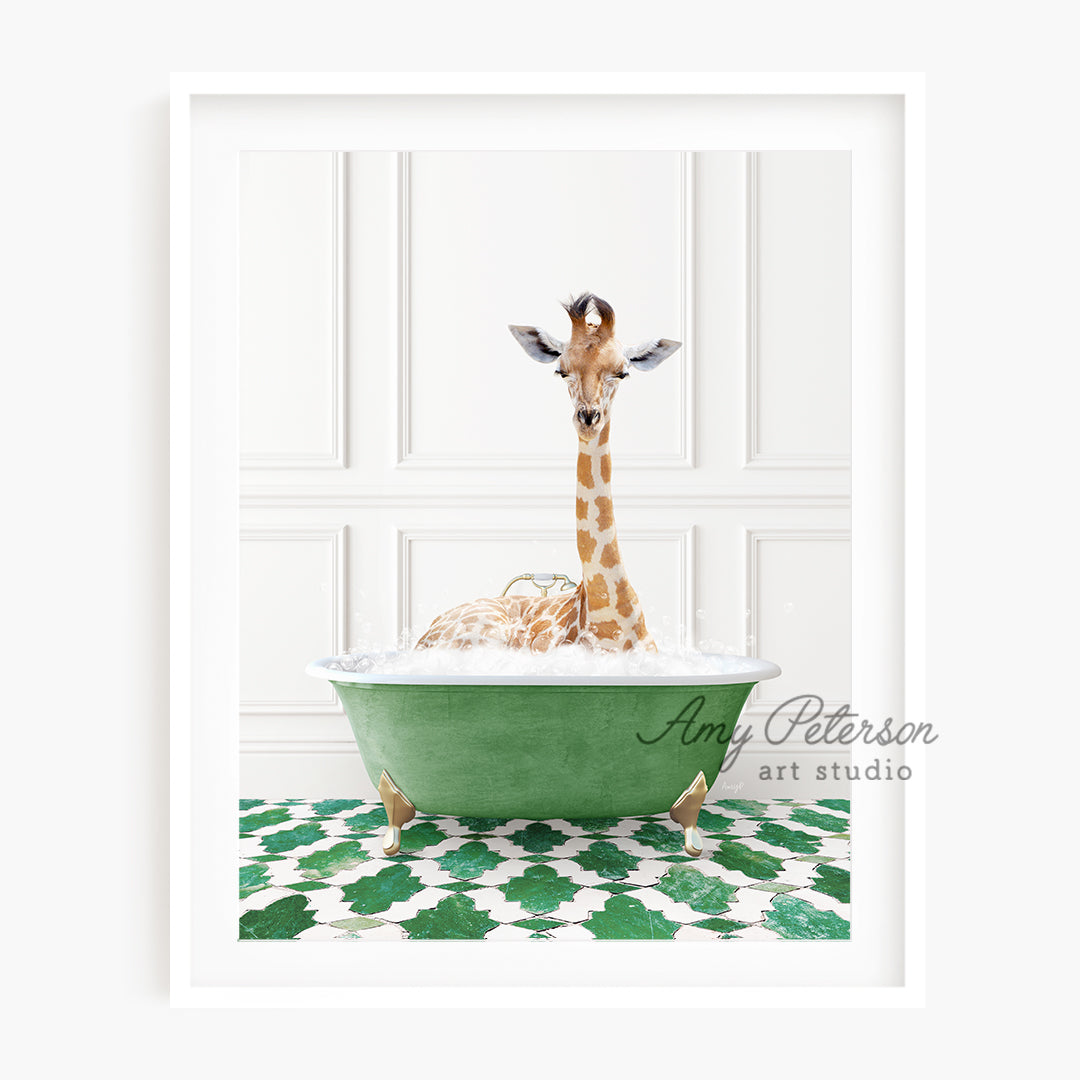 a baby giraffe in a green bath tub