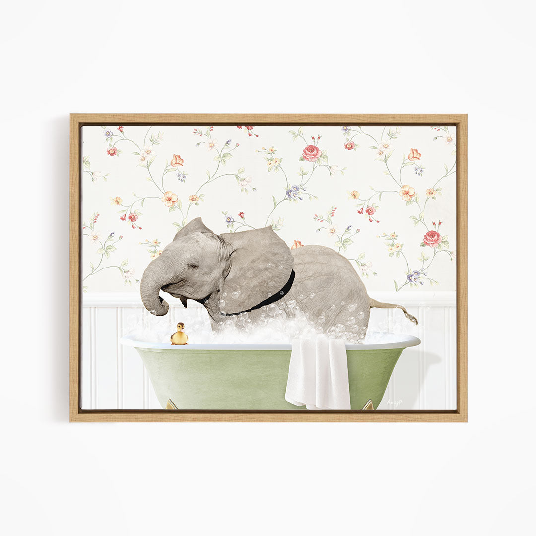 A gray elephant is sitting in a green bathtub, surrounded by a floral wallpaper.
