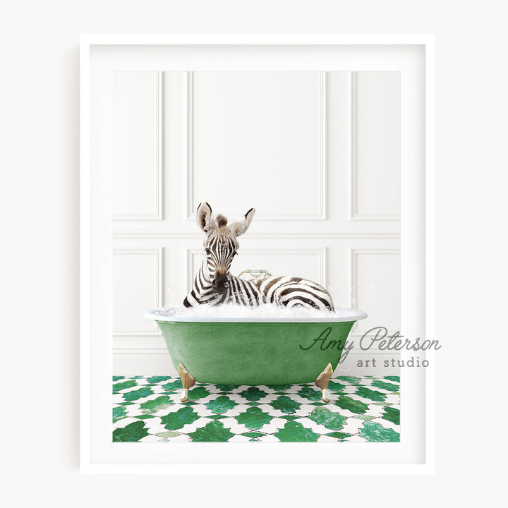 a zebra laying in a green bath tub