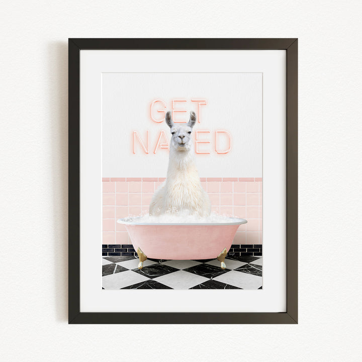 A white llama sitting in a pink bathtub with a pink and white checkered floor, and a pink and white wall with the text "GET NAKED" written on it.