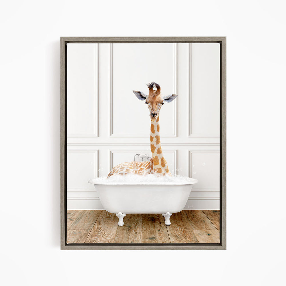 A giraffe is sitting in a white bathtub, appearing to enjoy the bath.