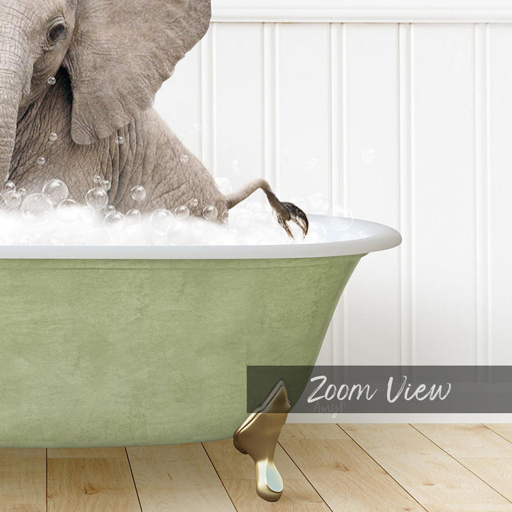 A large elephant is taking a bath in a green bathtub, surrounded by bubbles.